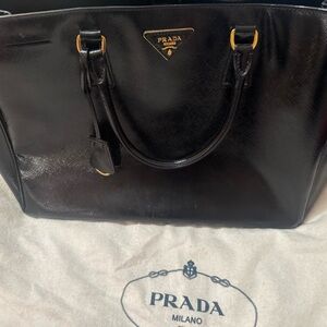 Prada Black Leather Handbag with Gold Accents